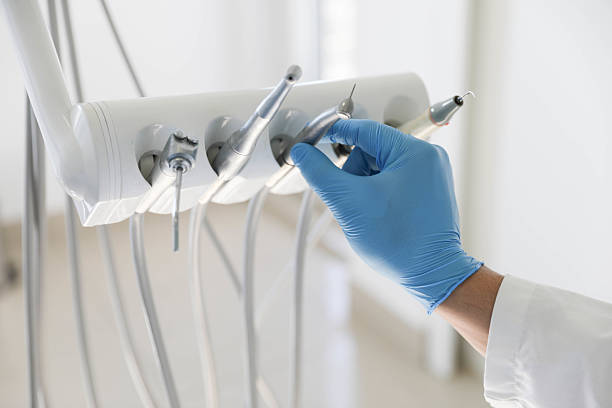 Professional Tooth Extraction technician working in Lily Lake, IL